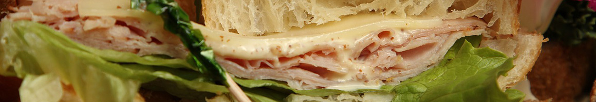Eating Sandwich Cafe at Berkeley Perk Cafe restaurant in Boston, MA.